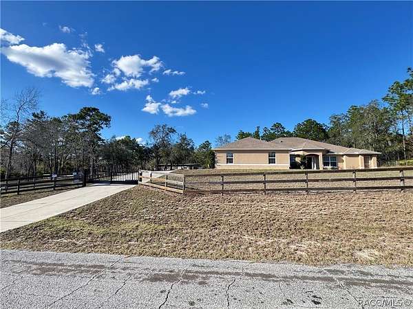 2.79 Acres of Land with Home for Sale in Beverly Hills, Florida