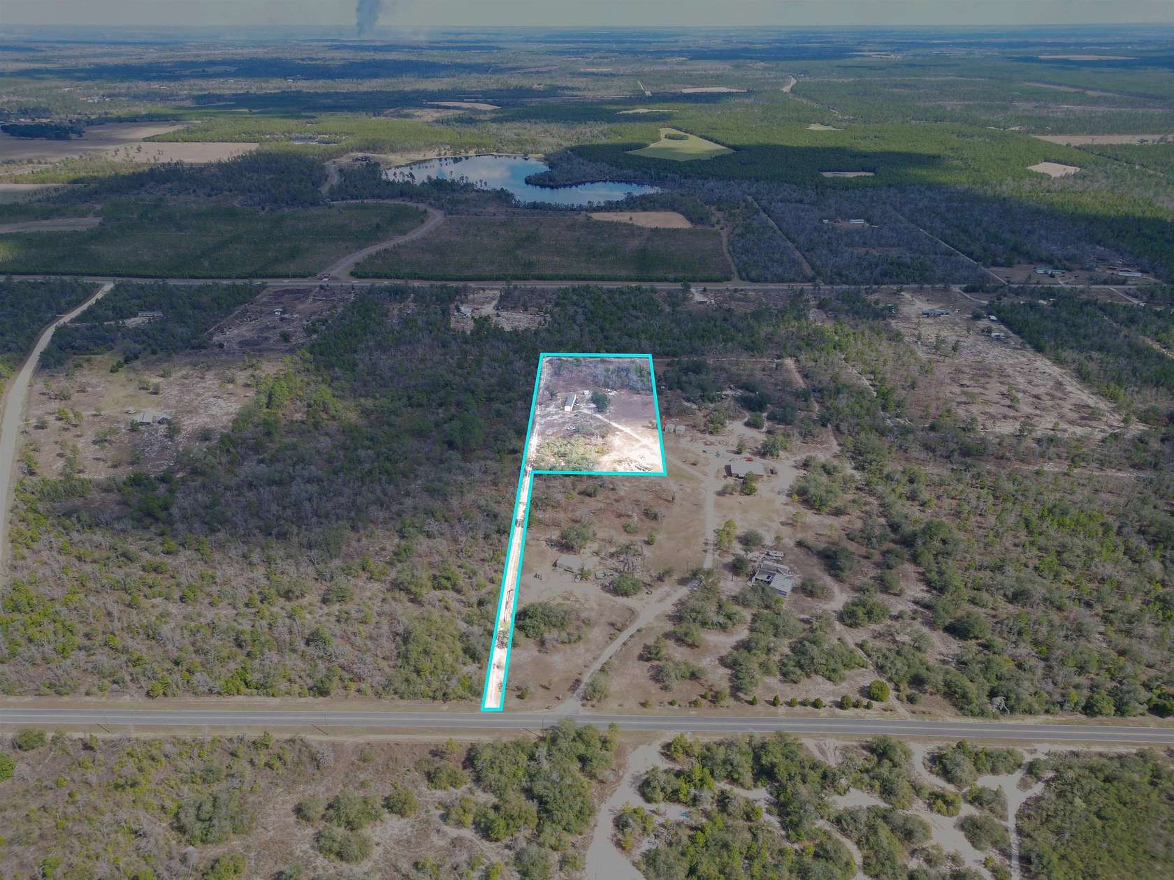 5 Acres of Land with Home for Sale in Altha, Florida