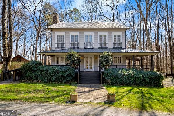 9.38 Acres of Land with Home for Sale in Moreland, Georgia