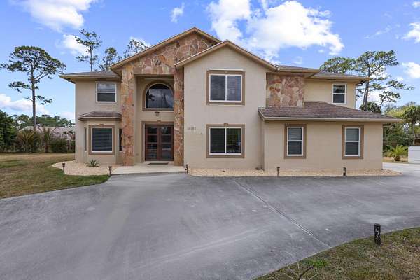 2.29 Acres of Land with Home for Sale in Loxahatchee Groves, Florida