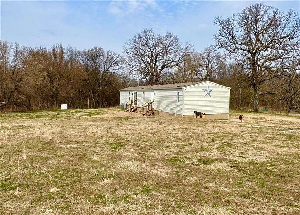 5 Acres of Land with Home for Sale in Summers, Arkansas