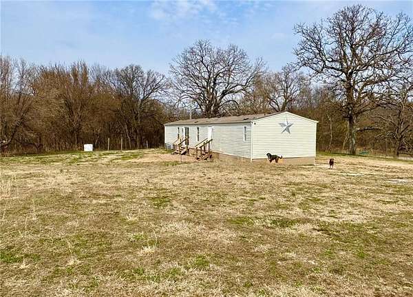 5 Acres of Land with Home for Sale in Summers, Arkansas