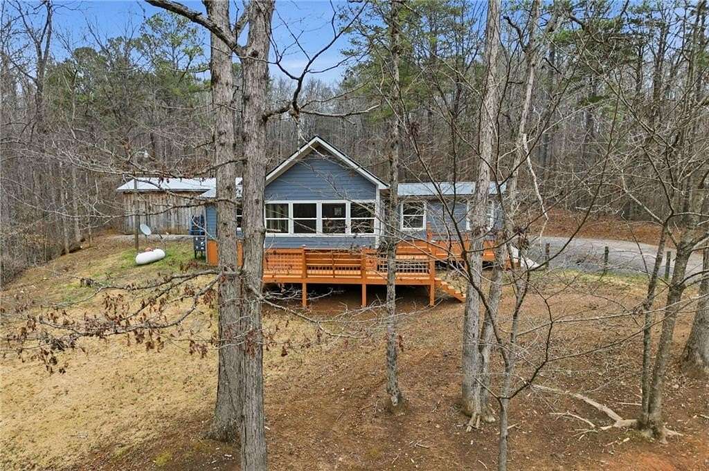 5.4 Acres of Land with Home for Sale in Ball Ground, Georgia