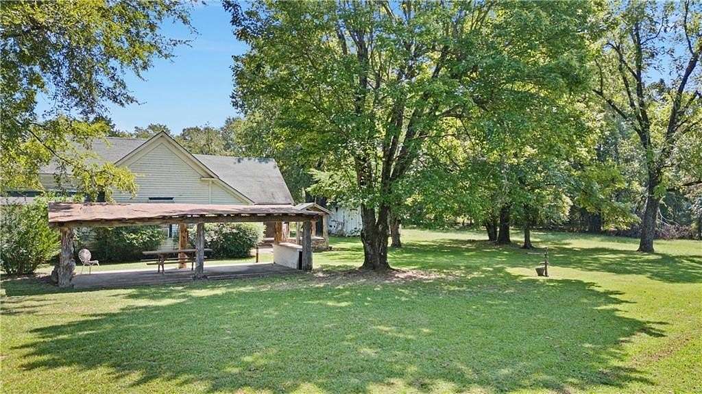 80 Acres of Agricultural Land with Home for Sale in Clarksville, Arkansas