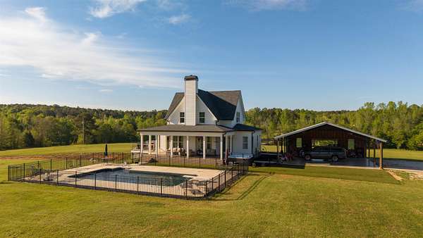 55.7 Acres of Land with Home for Sale in White Plains, Georgia