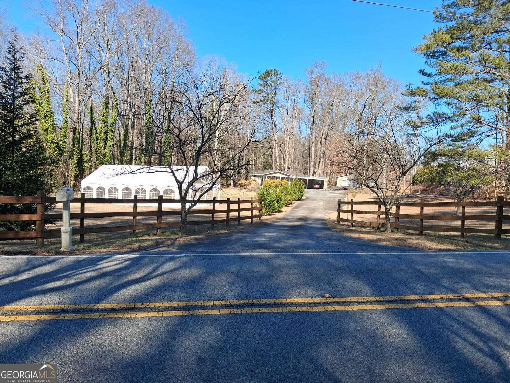 2.46 Acres of Land with Home for Sale in Powder Springs, Georgia