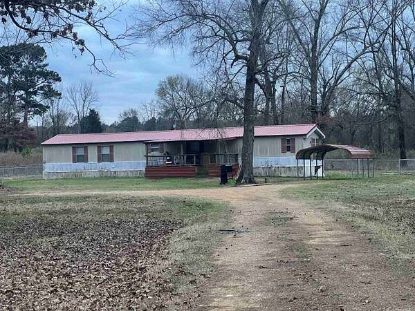 1.5 Acres of Land with Home for Sale in Lockesburg, Arkansas