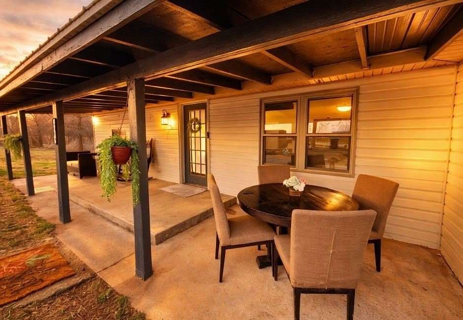 1.5 Acres of Land with Home for Sale in Harrison, Arkansas