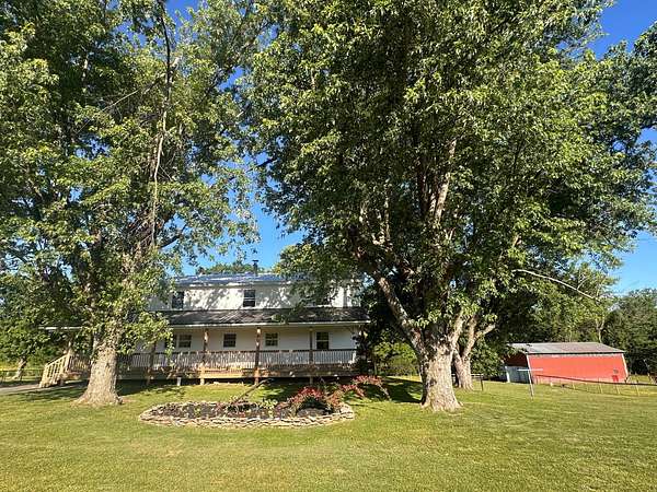 16.2 Acres of Land with Home for Sale in Summer Shade, Kentucky