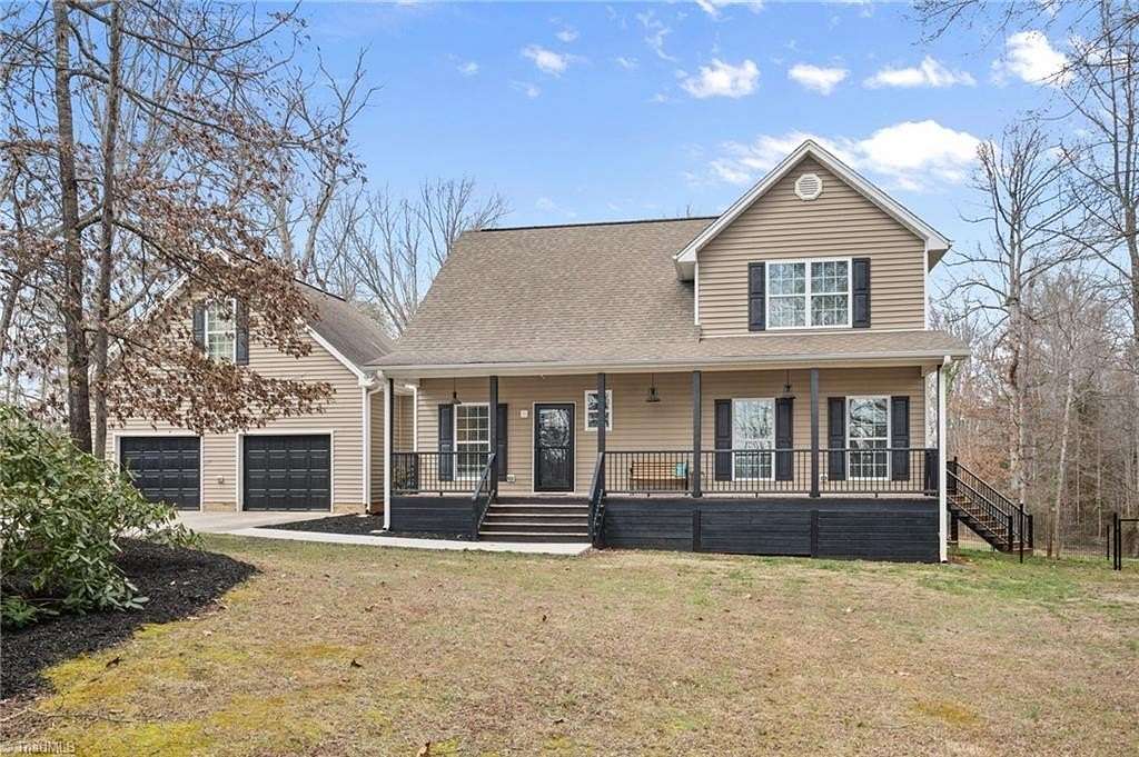 3 Acres of Land with Home for Sale in Summerfield, North Carolina