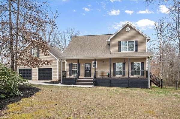 3 Acres of Land with Home for Sale in Summerfield, North Carolina