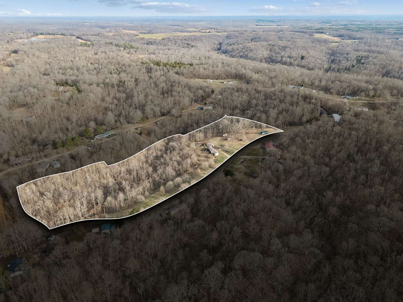 7.64 Acres of Land with Home for Sale in Indian Mound, Tennessee