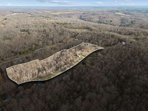 7.64 Acres of Land with Home for Sale in Indian Mound, Tennessee