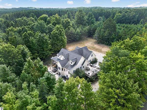 10.2 Acres of Land with Home for Sale in Williamsburg, Michigan