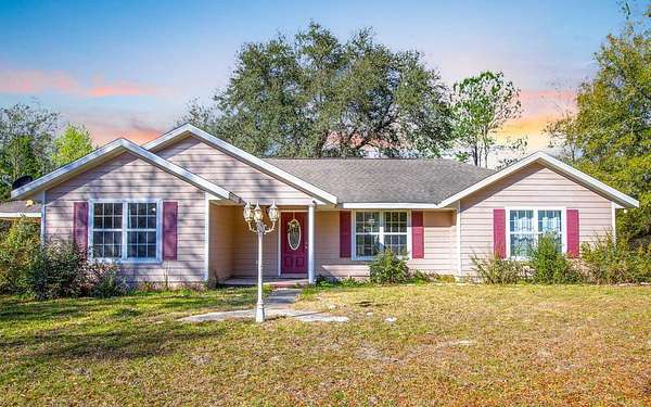 12.7 Acres of Land with Home for Sale in Lake City, Florida