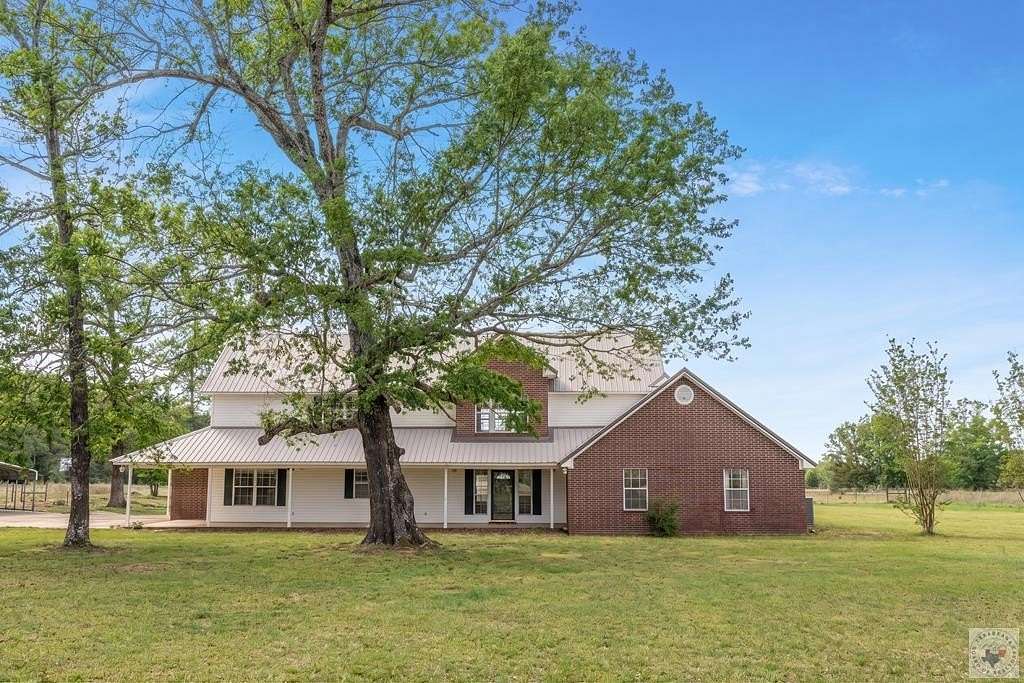 9.64 Acres of Land with Home for Sale in New Boston, Texas