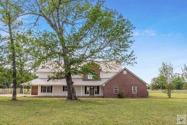 9.64 Acres of Land with Home for Sale in New Boston, Texas
