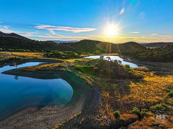 225 Acres of Land with Home for Sale in Mancos, Colorado
