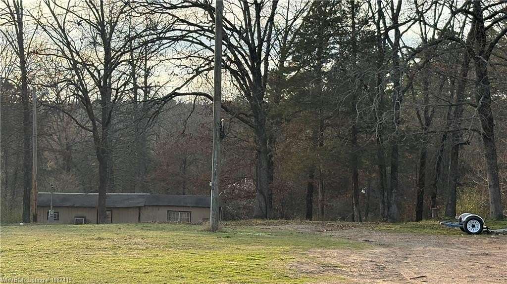 6.4 Acres of Land with Home for Sale in Mulberry, Arkansas