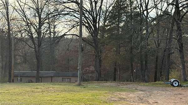 6.4 Acres of Land with Home for Sale in Mulberry, Arkansas