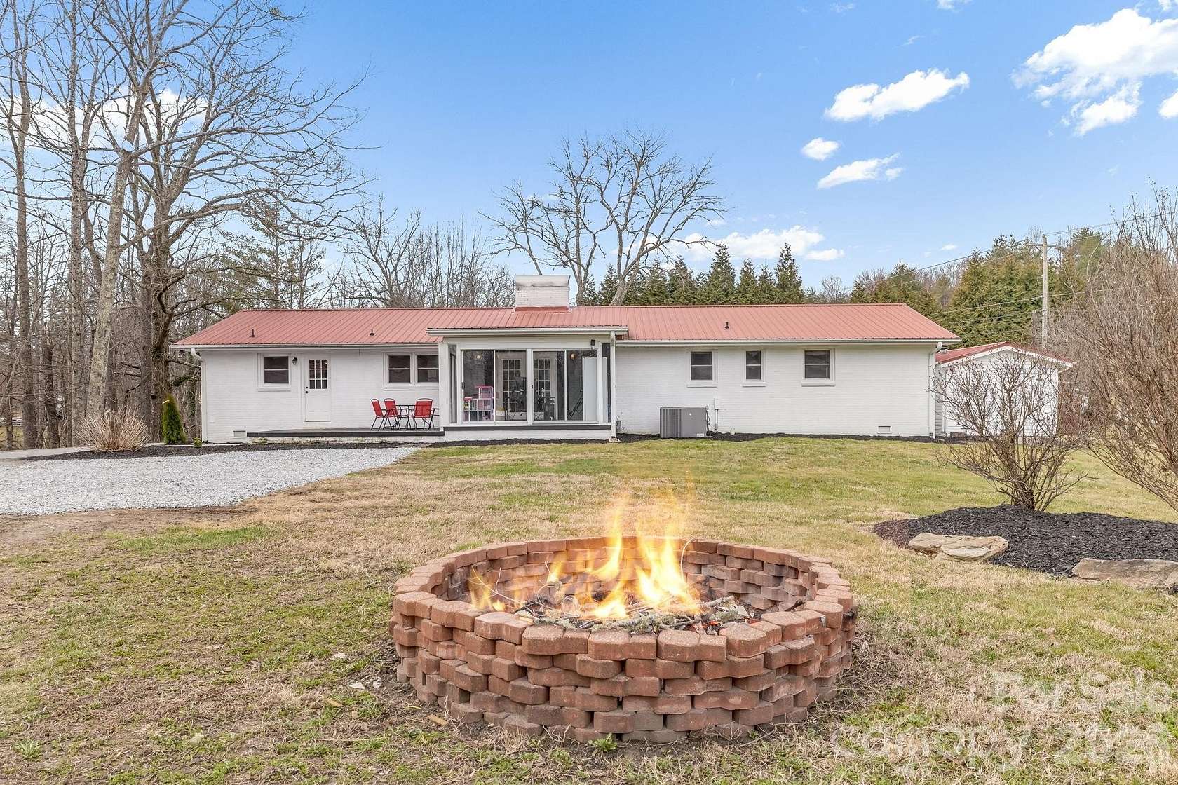 1.85 Acres of Land with Home for Sale in Hendersonville, North Carolina