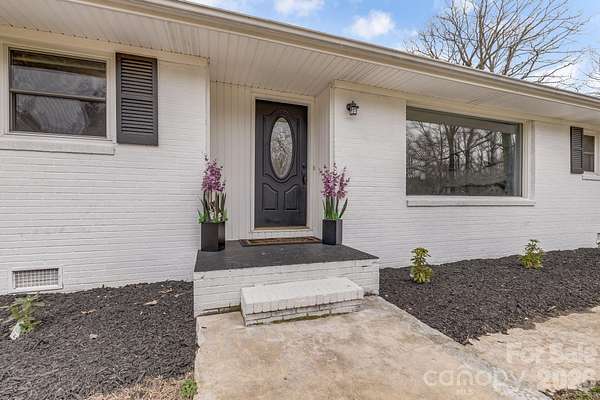 1.85 Acres of Land with Home for Sale in Hendersonville, North Carolina