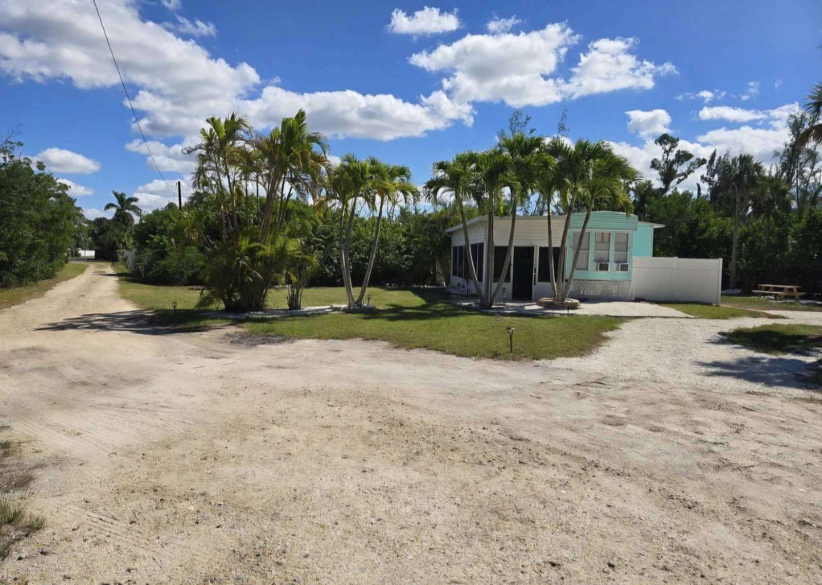 1.8 Acres of Land with Home for Sale in Bokeelia, Florida