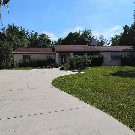 1.5 Acres of Land with Home for Sale in Leesburg, Florida