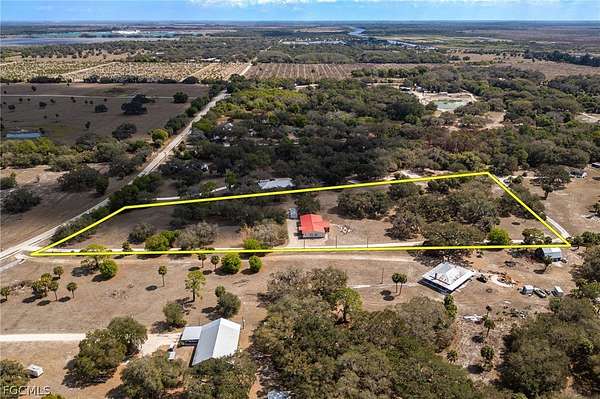6.14 Acres of Land with Home for Sale in Moore Haven, Florida