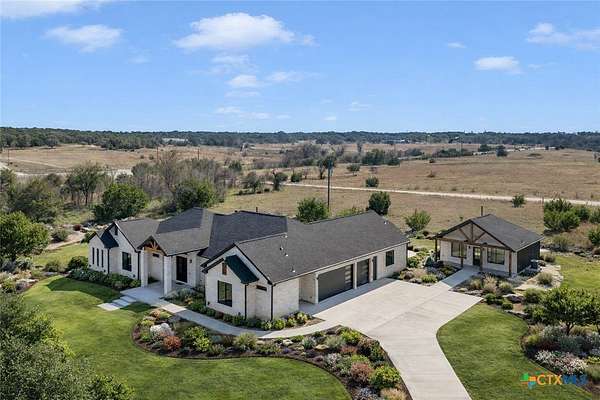 5 Acres of Land with Home for Sale in Briggs, Texas