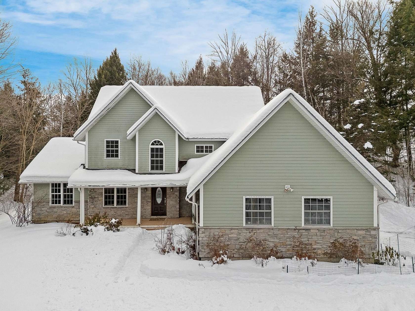 3 Acres of Land with Home for Sale in Waterbury, Vermont