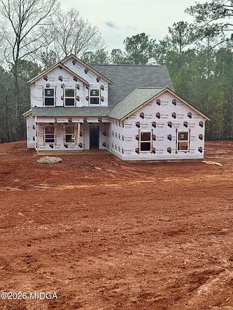 1.64 Acres of Land with Home for Sale in Forsyth, Georgia