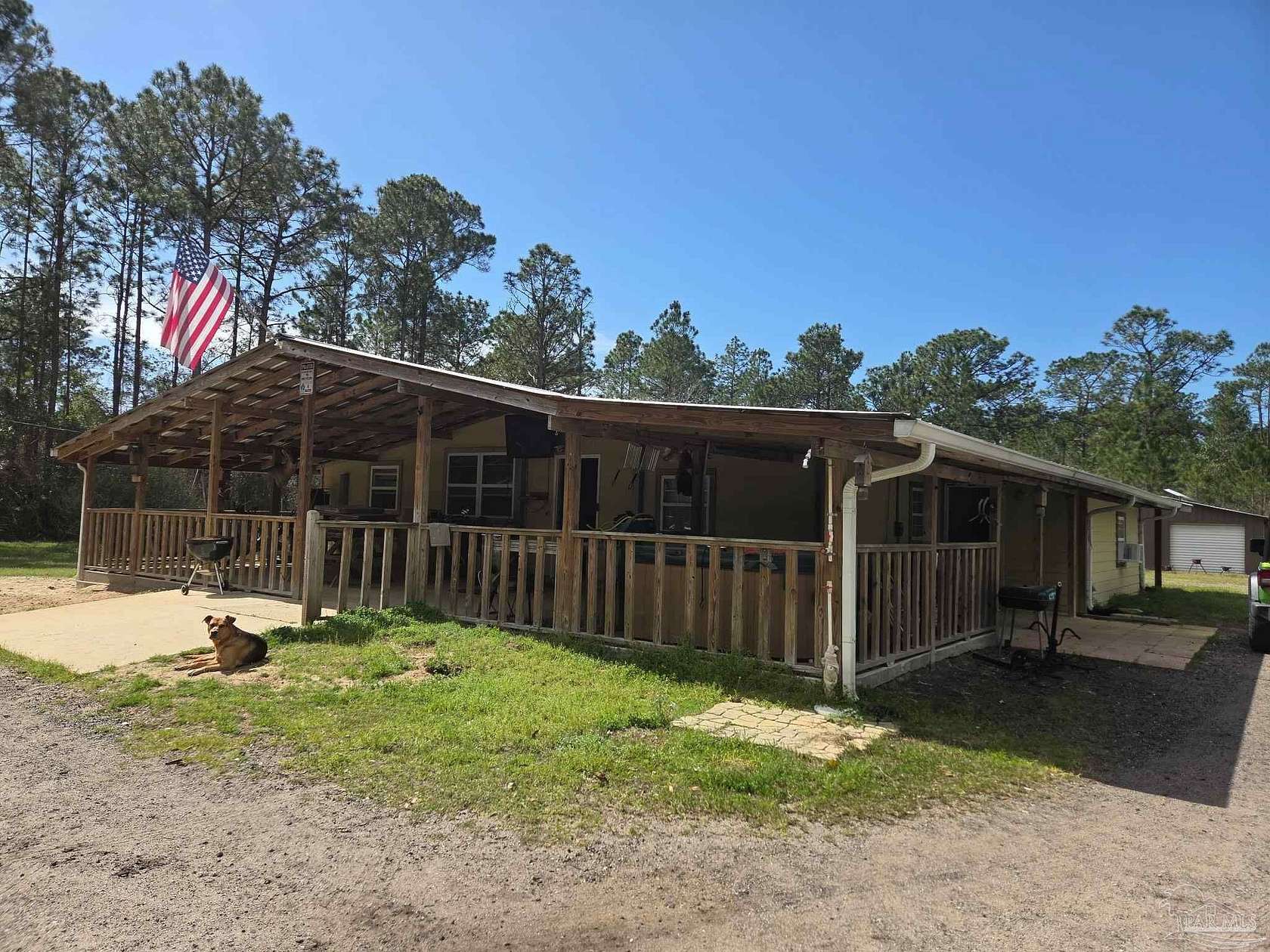 1.5 Acres of Land with Home for Sale in Milton, Florida