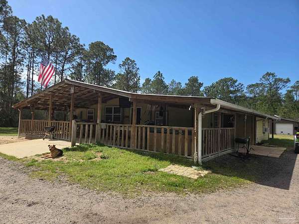 1.5 Acres of Land with Home for Sale in Milton, Florida