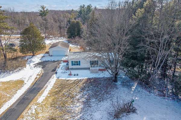 2.88 Acres of Land with Home for Sale in Stanwood, Michigan