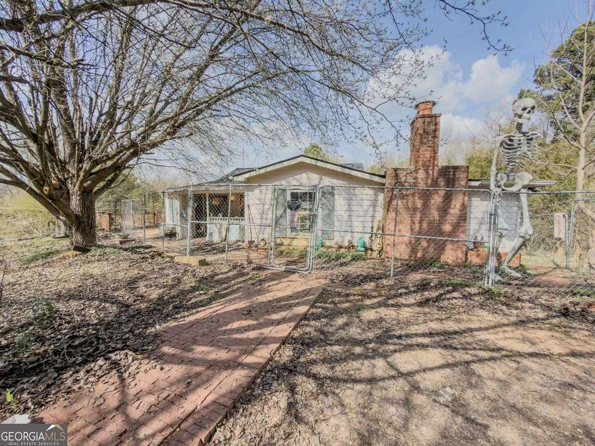 2.6 Acres of Land with Home for Sale in Braselton, Georgia