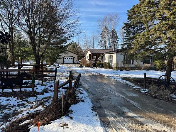 2.44 Acres of Land with Home for Auction in Waterford, Pennsylvania