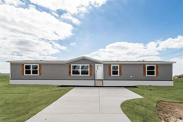 1.59 Acres of Land with Home for Sale in Terrell, Texas