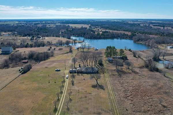 7.19 Acres of Land with Home for Lease in Bonham, Texas