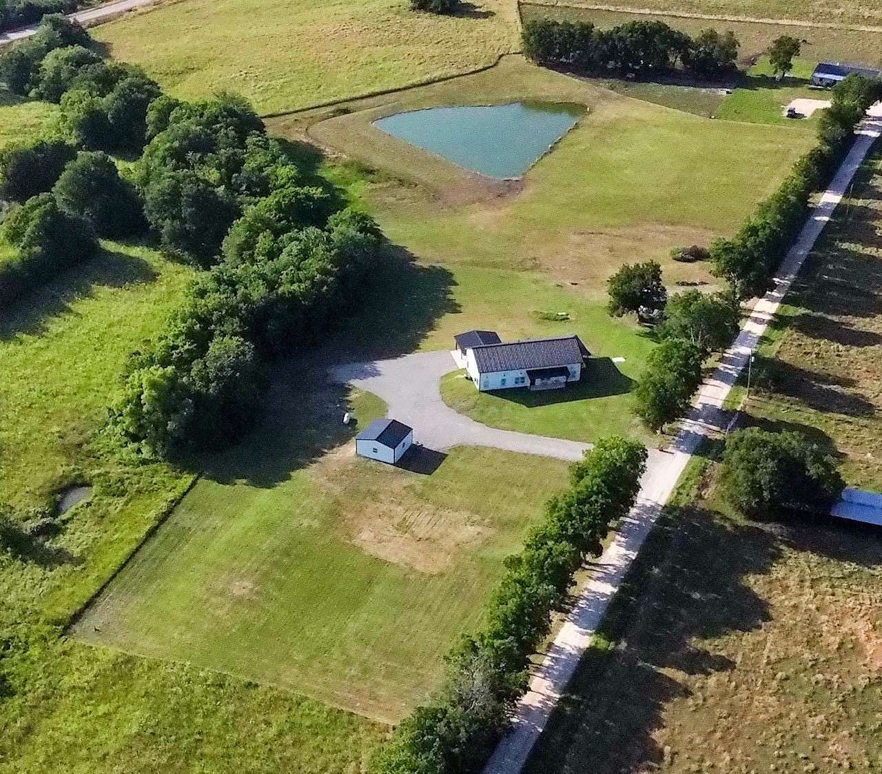 7 Acres of Land with Home for Sale in Honey Grove, Texas