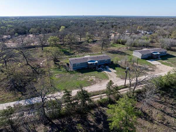 4 Acres of Land with Home for Sale in Cedar Creek, Texas
