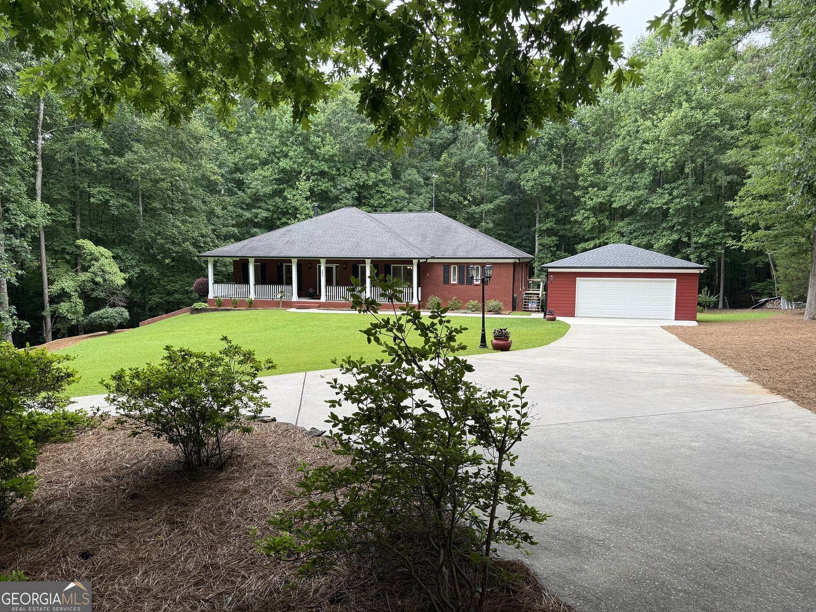 7.77 Acres of Land with Home for Sale in McDonough, Georgia