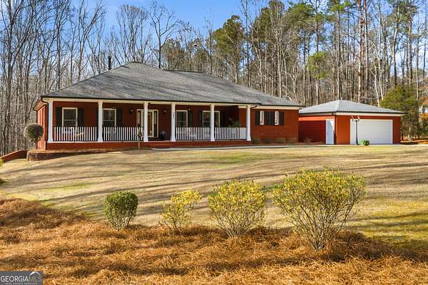 7.77 Acres of Land with Home for Sale in McDonough, Georgia