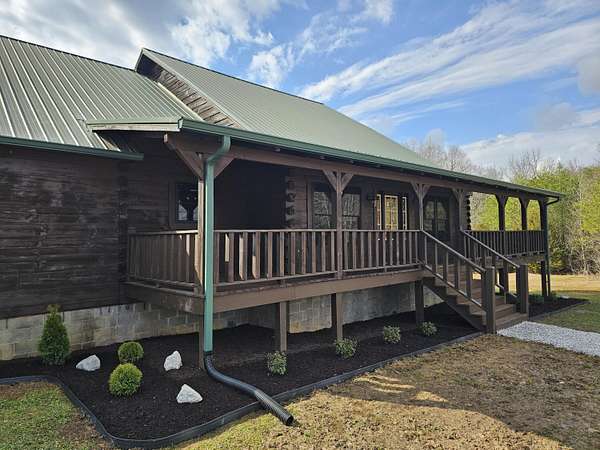 9.58 Acres of Land with Home for Sale in Madisonville, Tennessee