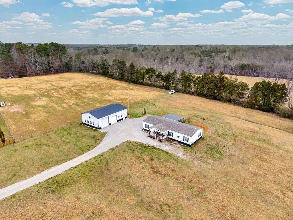 5.69 Acres of Land with Home for Sale in Walling, Tennessee