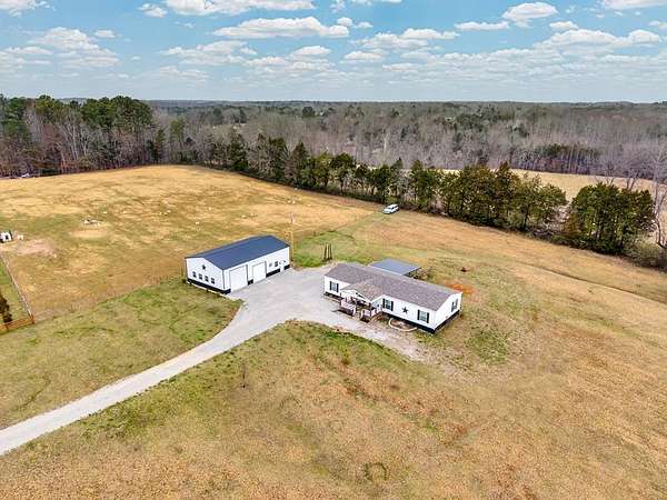 5.69 Acres of Land with Home for Sale in Walling, Tennessee