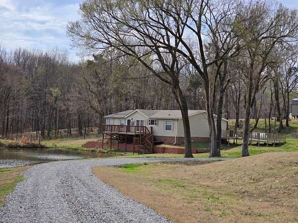 9.1 Acres of Land with Home for Sale in Colt, Arkansas