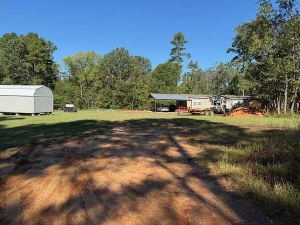11 Acres of Recreational Land with Home for Sale in Garrison, Texas