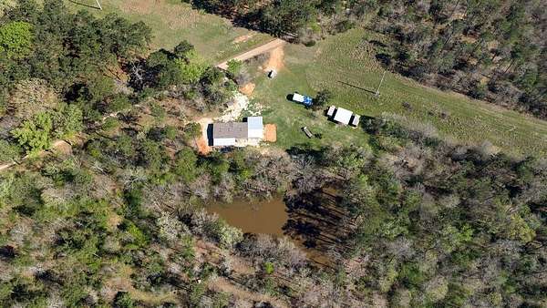 11 Acres of Recreational Land with Home for Sale in Garrison, Texas