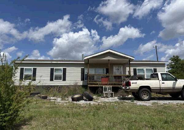 1.64 Acres of Land with Home for Auction in Alpine, Alabama